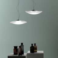 INFINITY Auergewhnliche Glas-Hngeleuchte Das schwungvoll geformte Lampenglas.