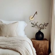 CERATIO Design Wandleuchte mit flexiblen Wandarm Flexible Wandleuchte am Bett.