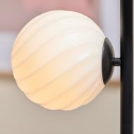 SWING 4-lam. Floor lamp with glass shades Leuchtenserie mit rundem, gedrehtem Lampenglas.