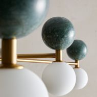 DALT Design Wandleuchte Schnes Details bildet der grne Marmor.