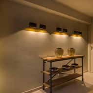 BOA SINGLE Indirekte LED Wandleuchte Stilvoll in rechte Licht gerckt. Ausfhrung mit Reflektor in Gold.