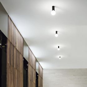FAT Cylindrical metal lamp holder Minimalistische Raumbeleuchtung mit der zylindrischen Leuchte.
