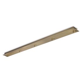 Elongated ceiling canopy with 5 outlets Das Deckenteil fr 5 Lampen in der Oberflche Messing.