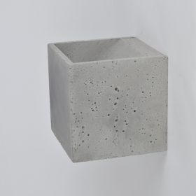 BUCI Wandleuchte aus Leichtbeton Schlichte Grundform mit Lichtaustritt oben und unten.